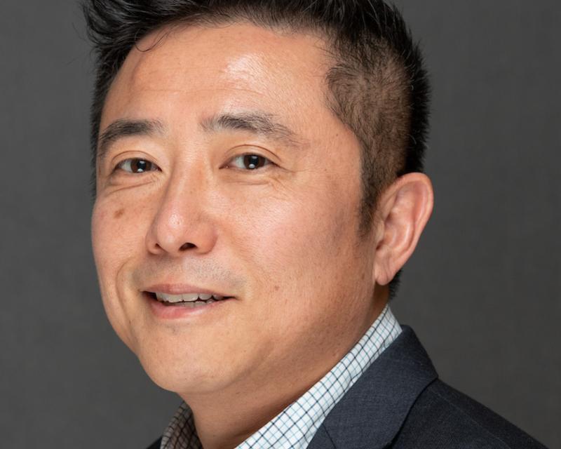 Portrait of Human Resources Manager Derek Kim