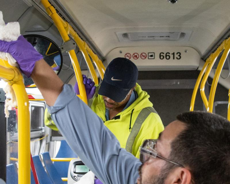 SFMTA Car Clean crew at work preparing a bus for a new day