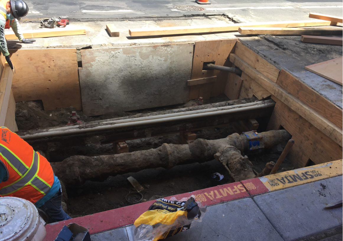 Water connection pit near Kearny and Geary streets, the last remaining location where crews are connecting properties’ water service over to the newly installed water mains.  