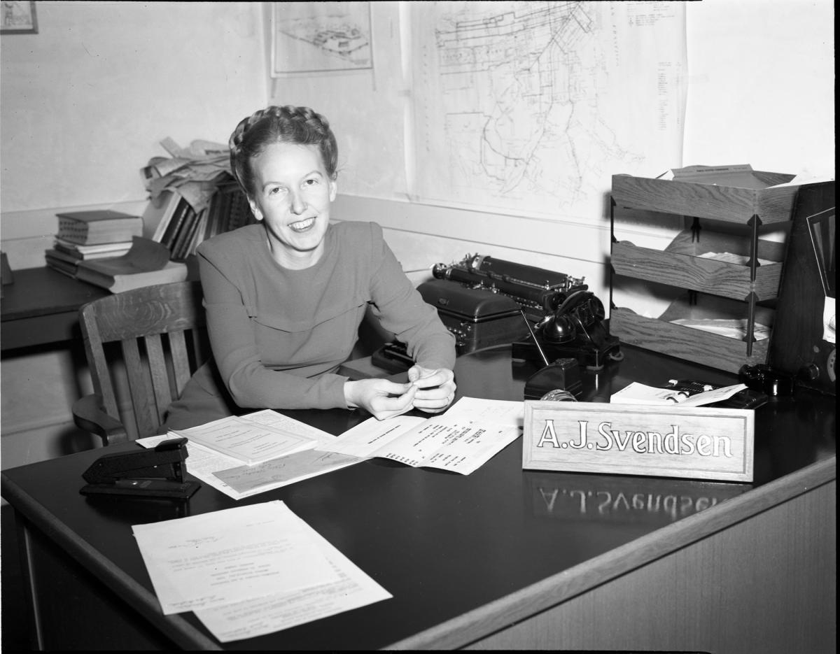 Adeline Svendsen sits at her desk in the Geneva Carhouse office building in this 1949 shot.