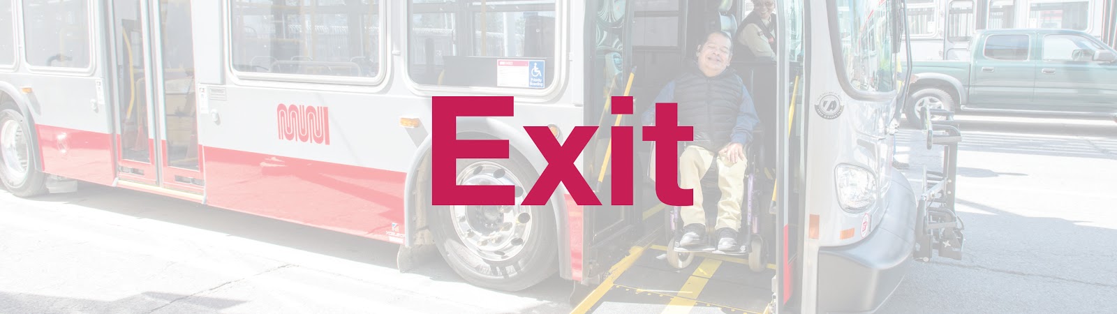 Exit: Image: A customer in a wheelchair alighting from a Muni bus.