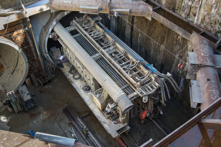 Tunneling machinery sits at the bottom of the 70-foot Central Subway retrieval shaft.