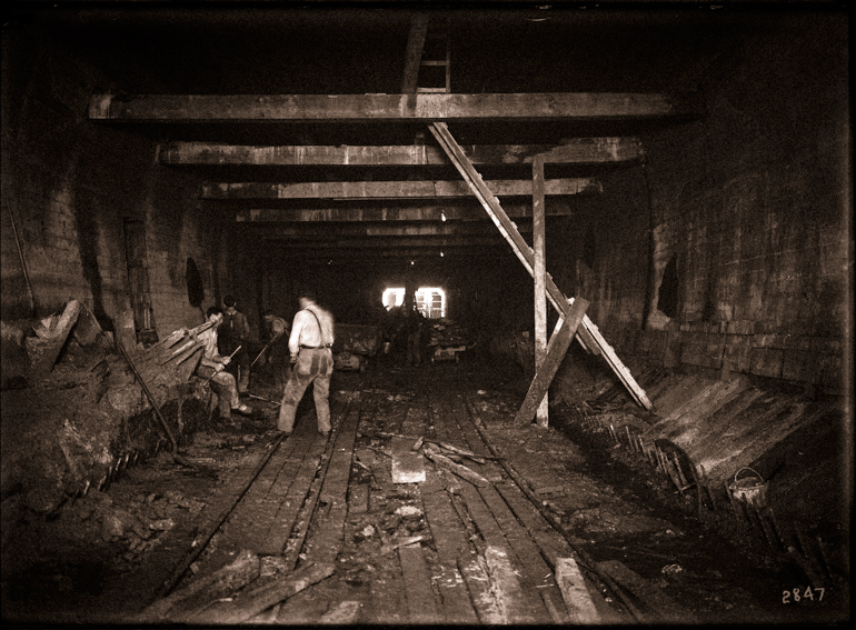 Workers Digging Rock and Dirt for Construction of Twin Peaks Tunnel near Eureka Station | Circa 1916