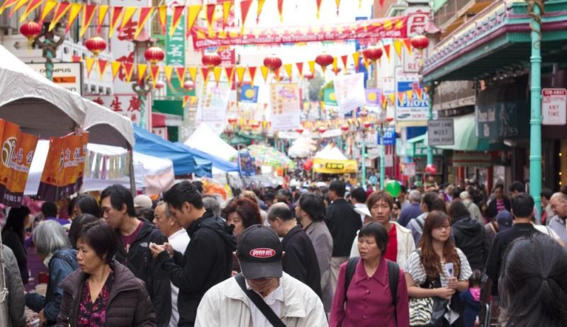A crowded street at the Autumn Moon Festival in Chinatown.