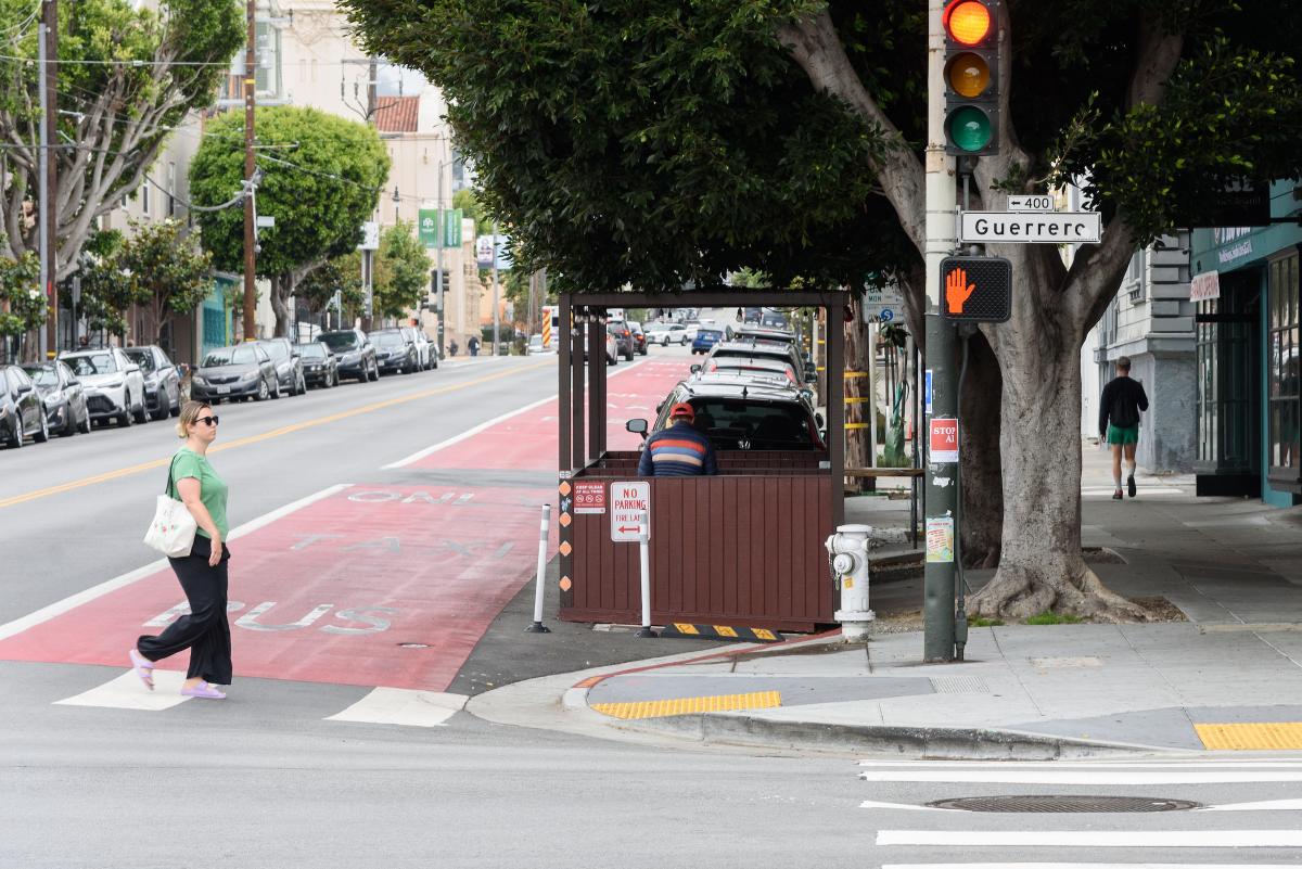 The transit-only lane and corner bulbouts improve transit reliability and pedestrian safety.