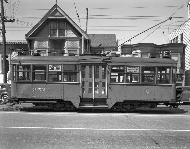 # Alt Text</p>
<p>J Type Streetcar 352 stopped on street at Masonic and Geary, San Francisco, 1942