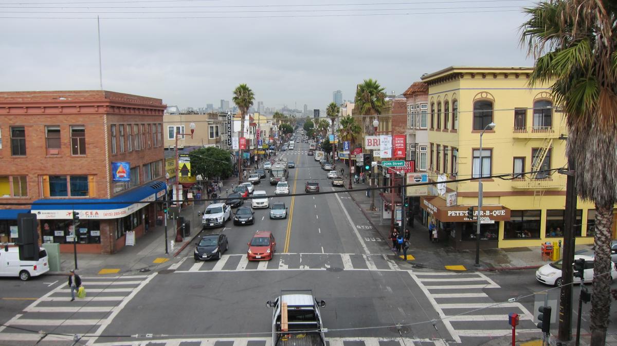 Looking northbound on Mission Street at 20th Street showing current lane configuration and traffic congestion.