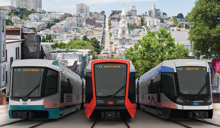 Three modern light rail vehicle designs displayed side-by-side with San Francisco cityscape in background.
