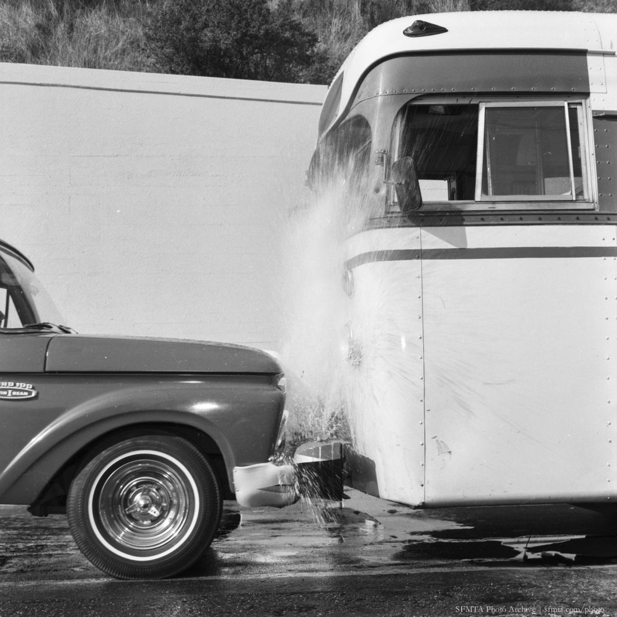 Water-filled bumper demonstration showing impact absorption between two vehicles, 1967.