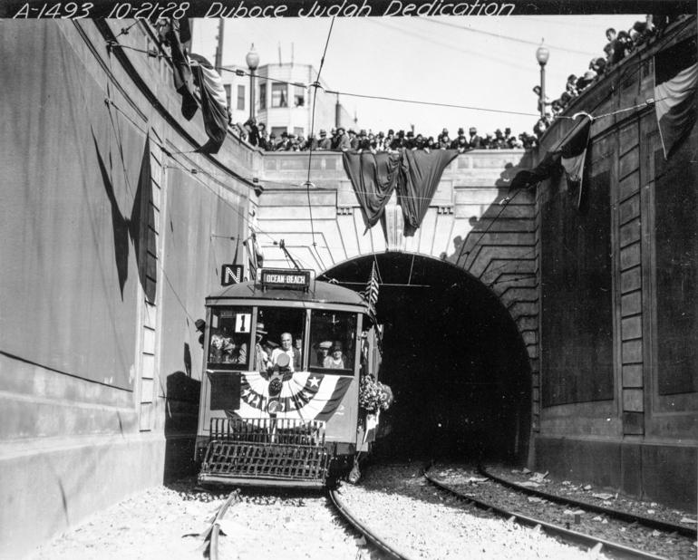 Mayor Sunny Jim Rolph pilots streetcar through West Portal Sunset Tunnel, N Judah Line opening, October 21, 1928.