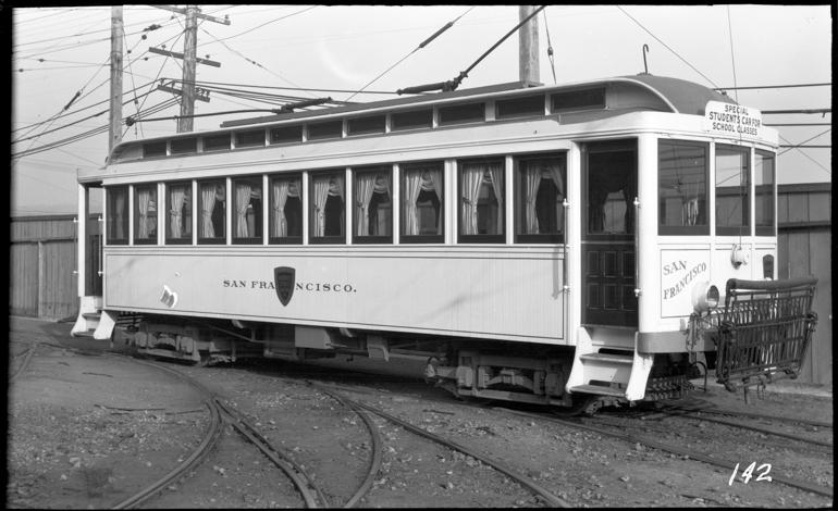 Historic San Francisco streetcar at Geneva Carhouse, 1928, used for student passenger service.