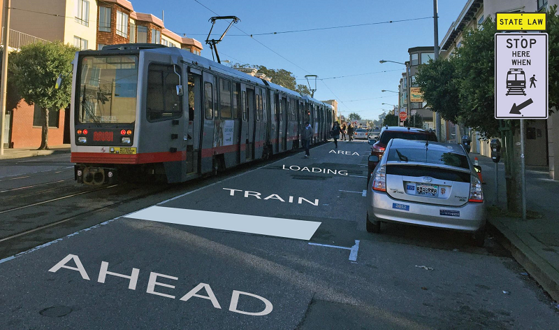 Light rail train approaching boarding zone marked on street with parked car and stop sign visible.