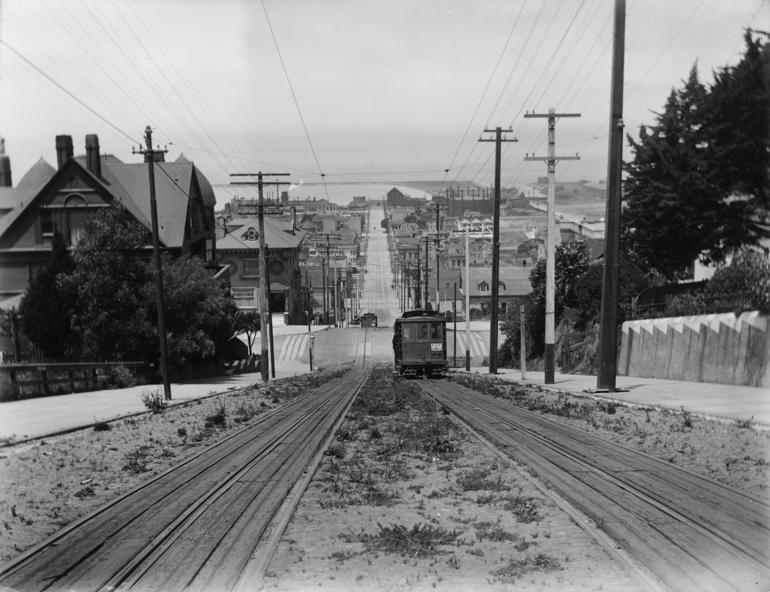 Fillmore streetcar on tracks climbing Pacific Heights, San Francisco, circa 1903, looking north toward the bay.