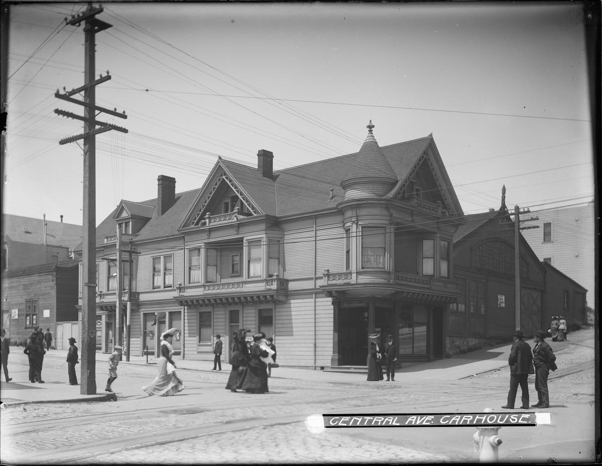 Central Avenue Carhouse at Presidio and Sacramento, circa 1904, with pedestrians and streetcar infrastructure.