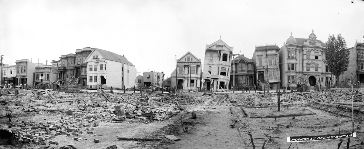 Damaged Victorian buildings and rubble on Howard Street after 1906 earthquake, San Francisco.