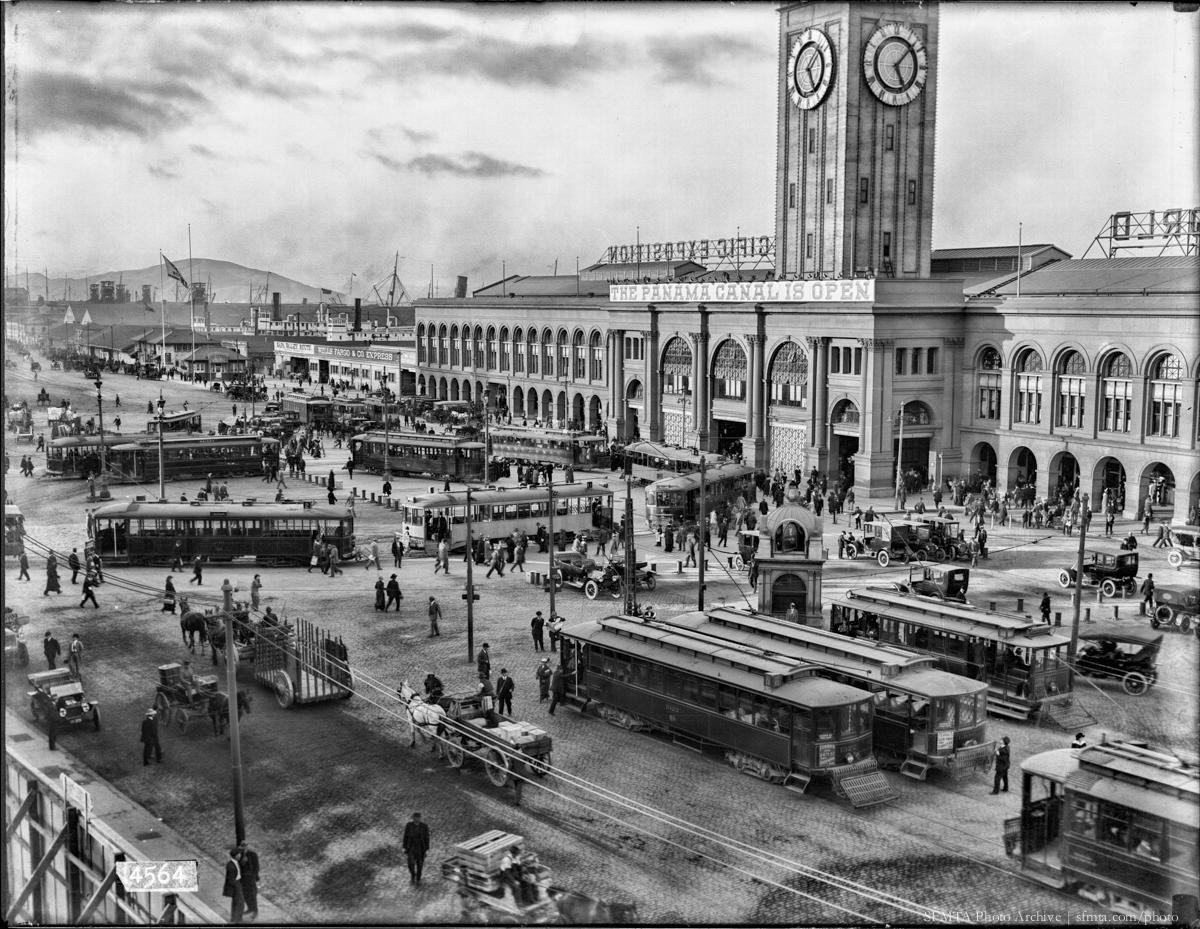 Ferry Building and streetcar terminal with crowds and vehicles, San Francisco, 1914