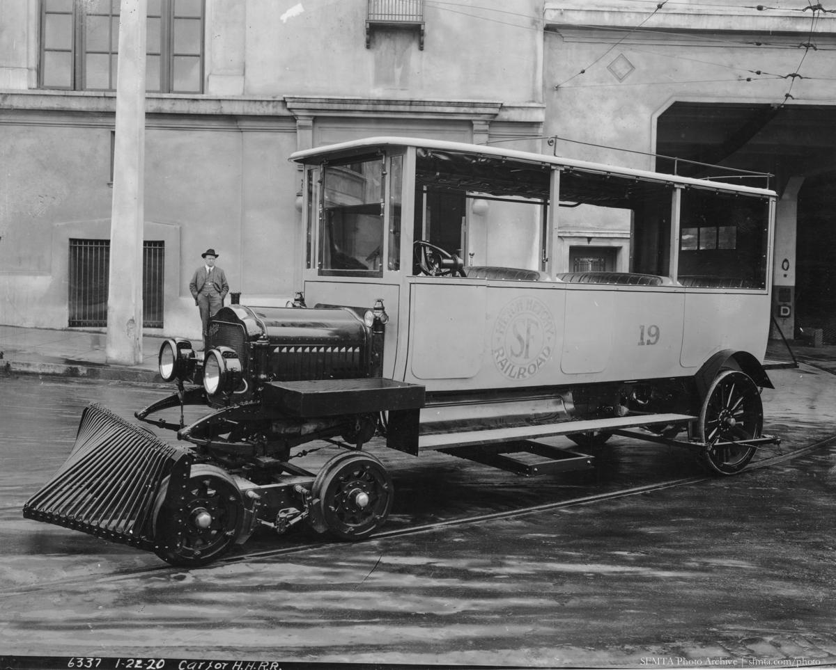 Motor Coach 19 modified for railroad use with sweeper attachment, 1920
