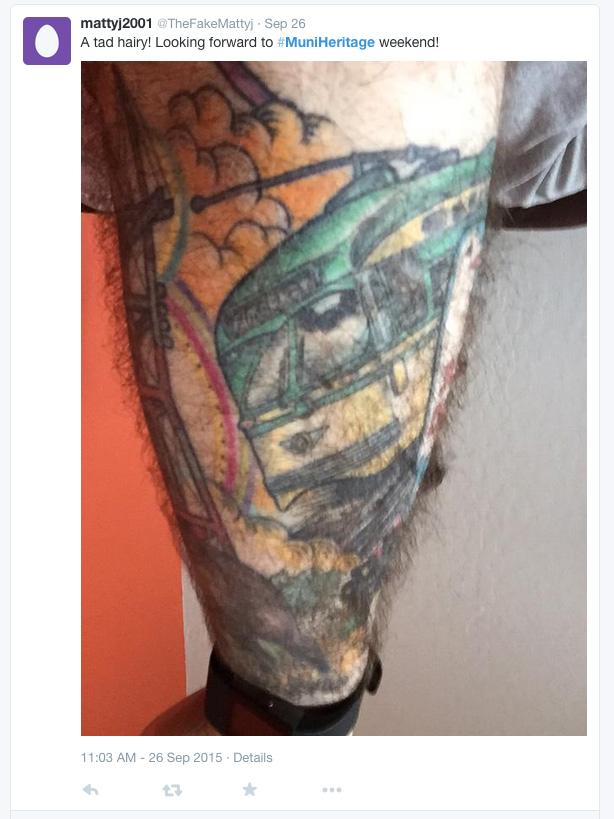 Colorful tattoo of a historic streetcar on someone's leg