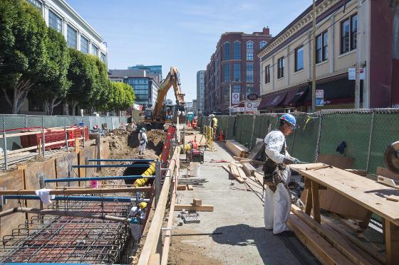Construction crew upgrading sewer infrastructure on 4th Street in downtown San Francisco.