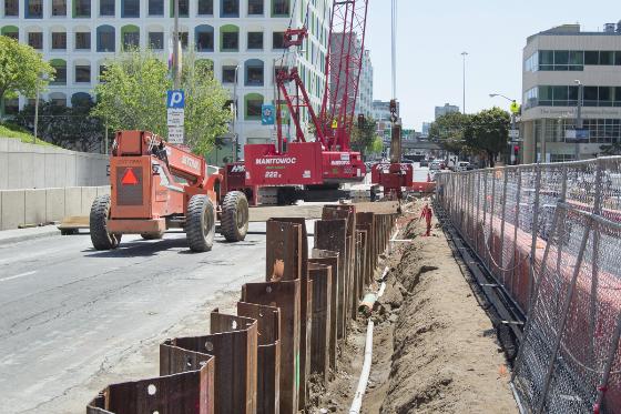 Construction equipment and steel pilings along 4th Street for Yerba Buena/Moscone Station project.