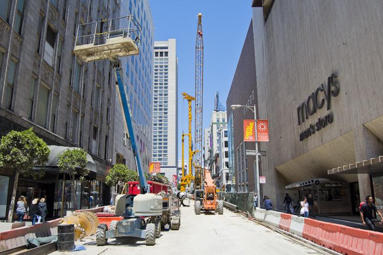 Construction equipment and barriers on Stockton Street in downtown San Francisco near Union Square.