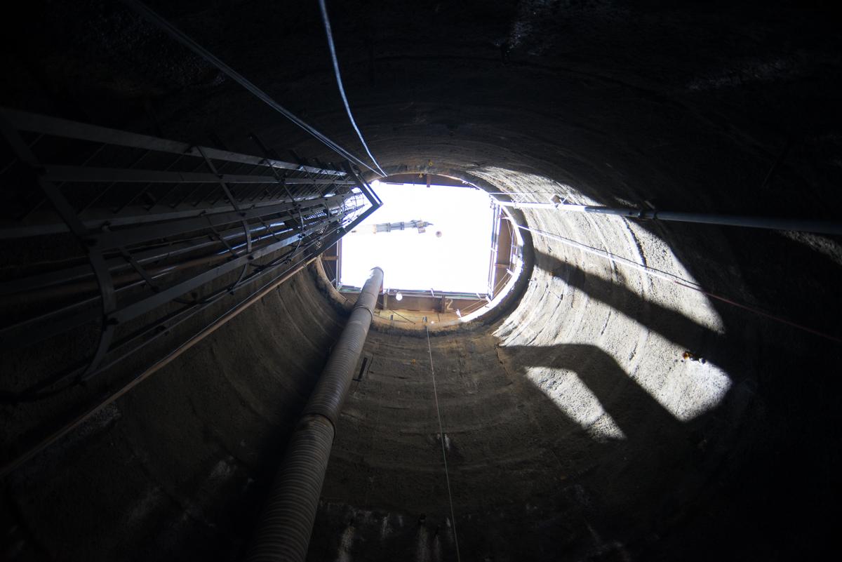 View looking up from north emergency exit shaft of Chinatown Station under construction.