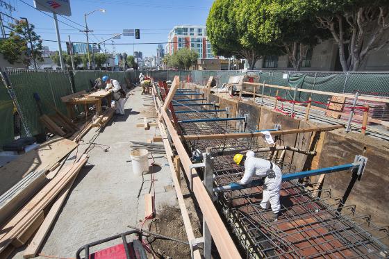 Construction crew installing rebar for sewer upgrade on 4th Street.