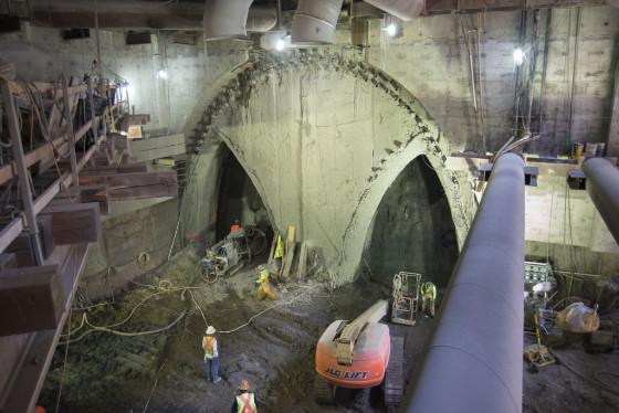 Workers excavate a large underground cavern for the Chinatown station of the Central Subway project.