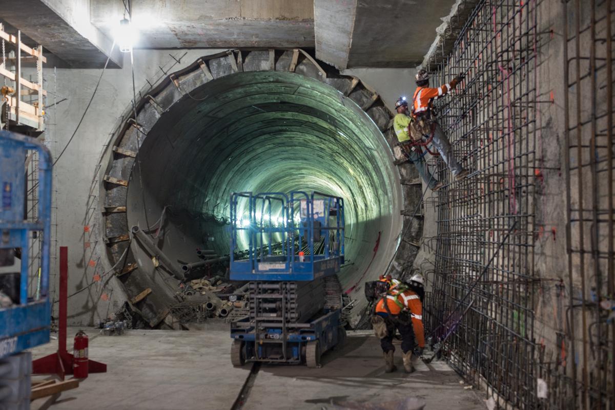 Construction workers assemble reinforcement cage inside Central Subway tunnel under San Francisco.