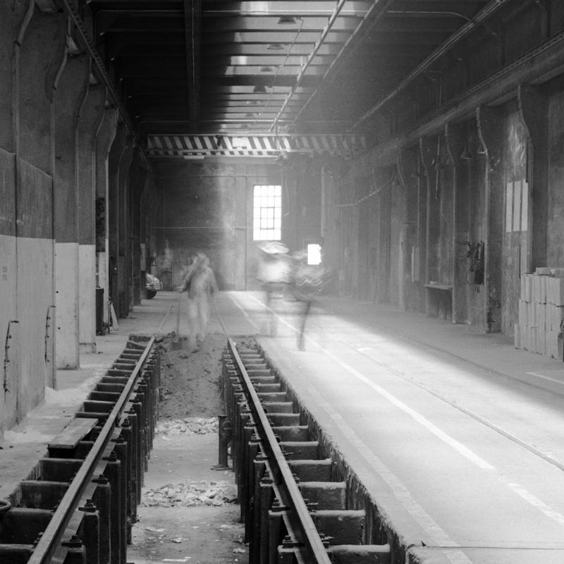Interior of Presidio Carhouse with inspection pit and rails, 1940s
