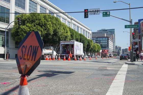 Street closure on 4th Street between Brannan and King streets with construction equipment and traffic cones for sewer line work.