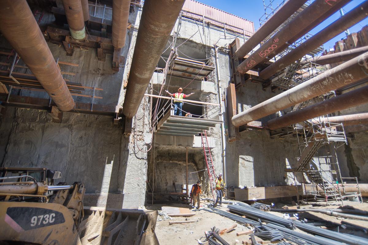 Construction workers install rebar inside concrete station box at Yerba Buena Moscone Station.
