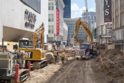 Construction equipment and excavation work on Stockton Street in downtown San Francisco.