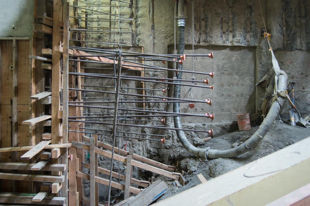 Rebar reinforcement installed inside headhouse structure during Chinatown Station platform excavation preparation.