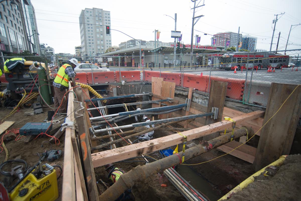 Construction workers reinforce underground infrastructure at 4th and Townsend Street in San Francisco.