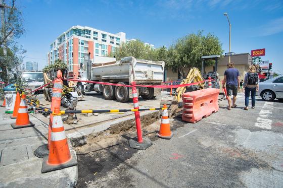 Construction crew performs utility potholing work on 4th and Brannan streets for Central Subway project.