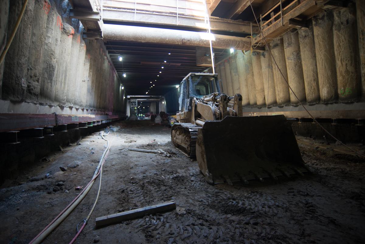 Construction equipment and debris inside Union Square Market Street Station tunnel during renovation work.