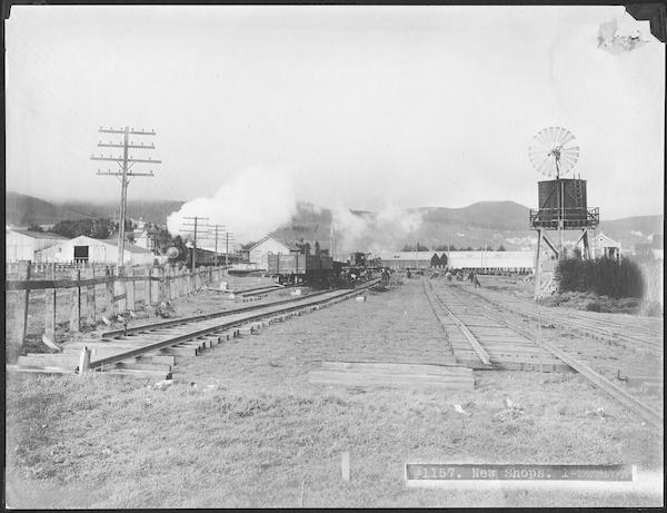 New Shops at Elkton with Southern Pacific Train Passing Elkton Station in Background | January 25, 1907