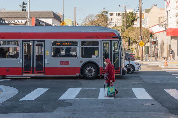 Photo:&nbsp;Geary&nbsp;Rapid&nbsp;bus and pedestrian traveling along Geary at Cook Street.&nbsp;&nbsp;