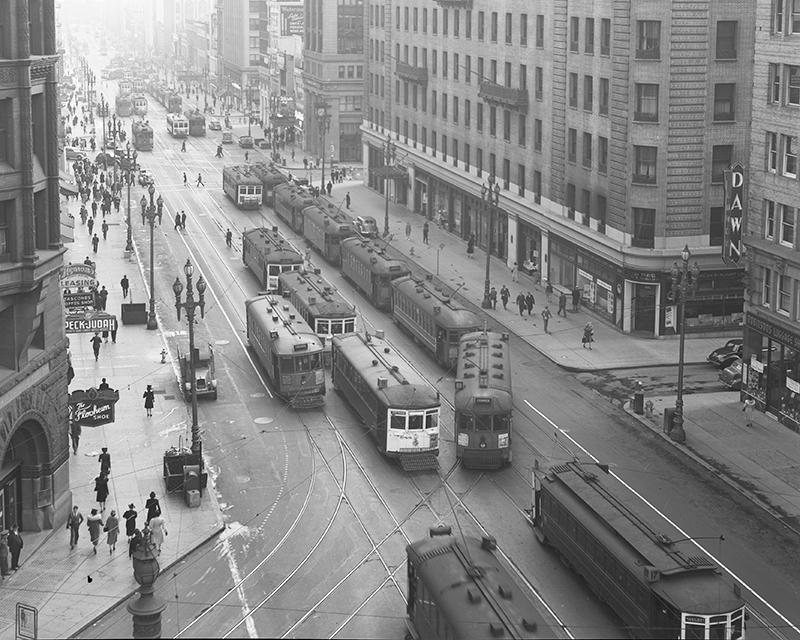 overhead view of Market Street crowded with streetcar traffic and pedestrians
