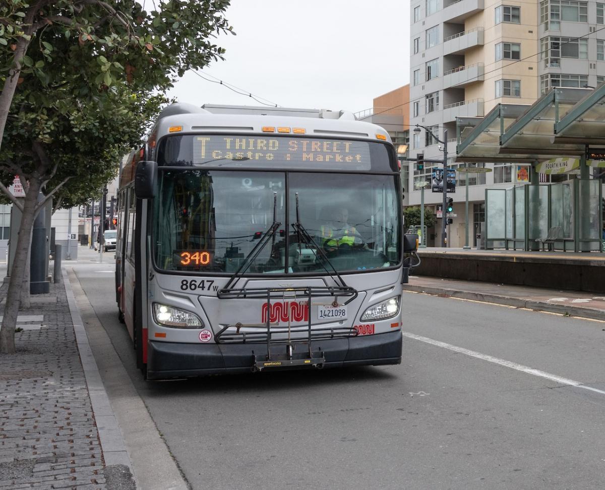 t third bus at bus stop 