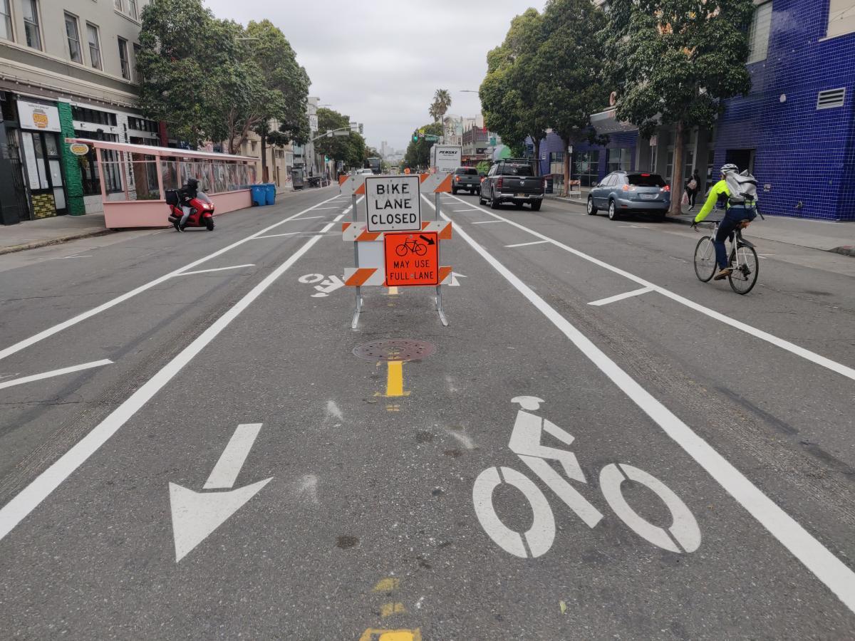 Bike lane is closed sign