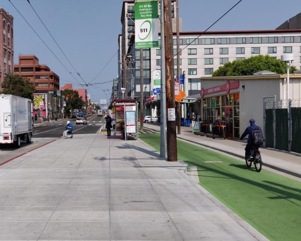 Photo of protected bikeway and bus boarding area near Catrain Station - September 2020