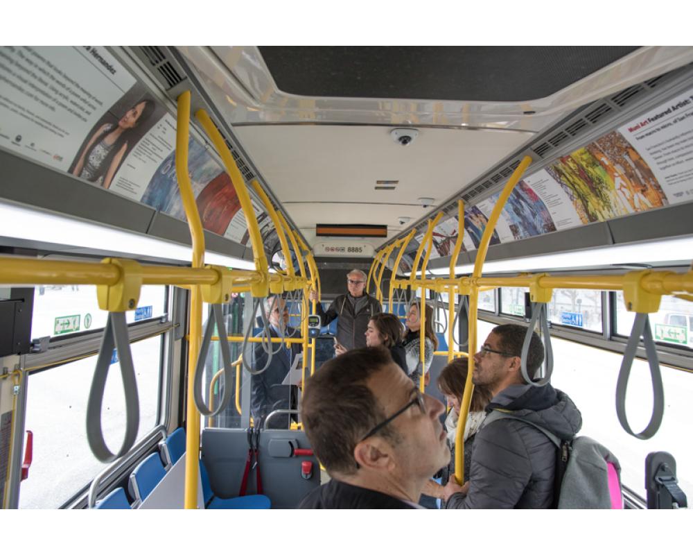 muni art and people in bus