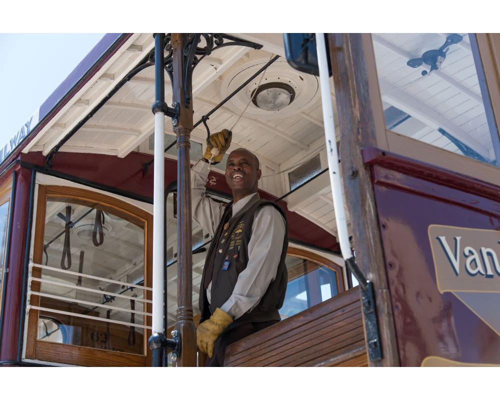 A cable car conductor rings the bell as part of the 2017 contest