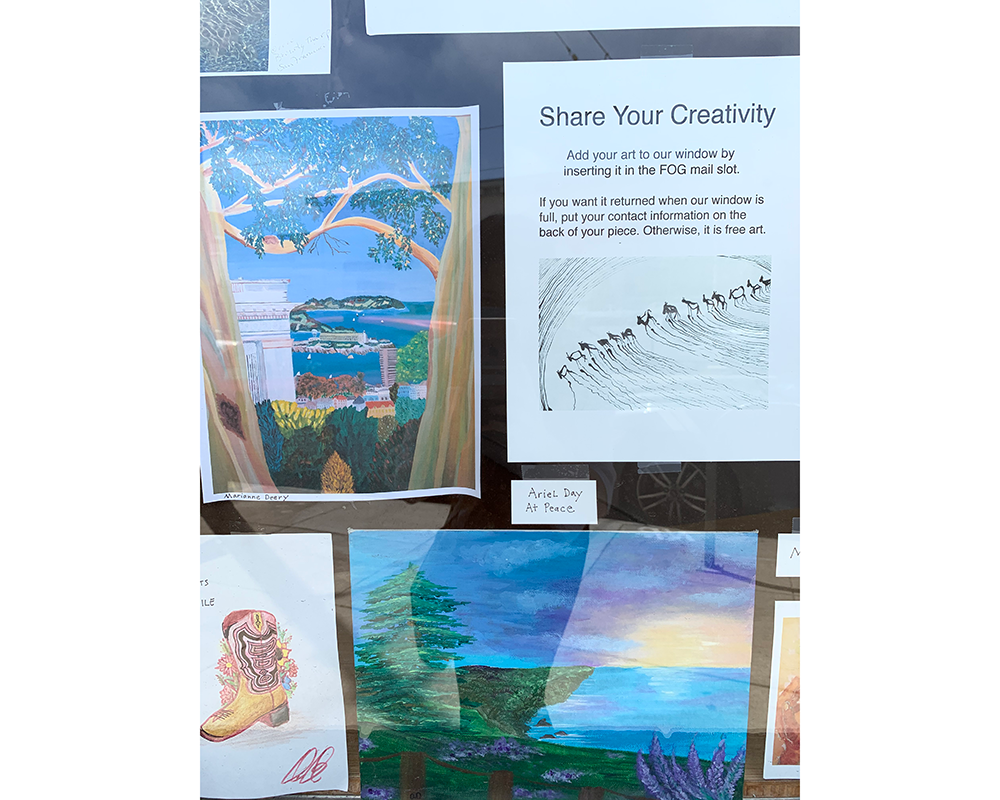 Large Store front window with art