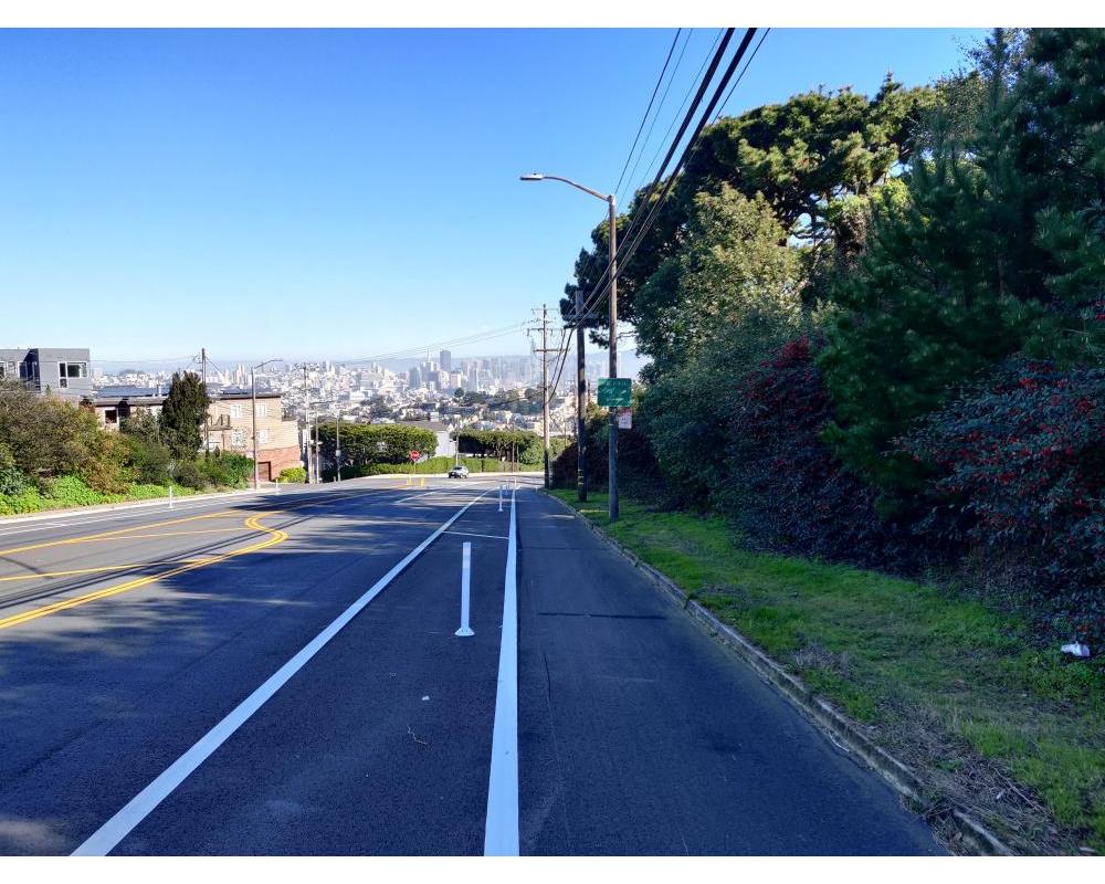 Clipper Street looking downhill with protected bikeway