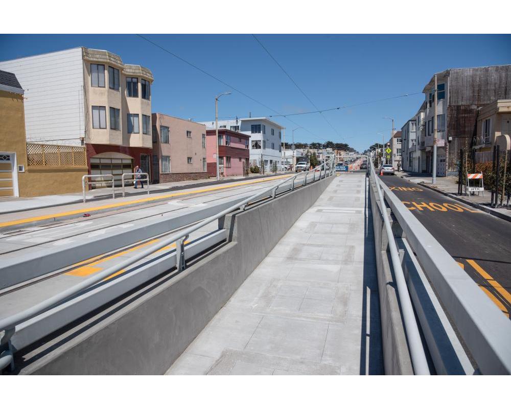 Photo of A wheelchair ramp attached to the accessible platform