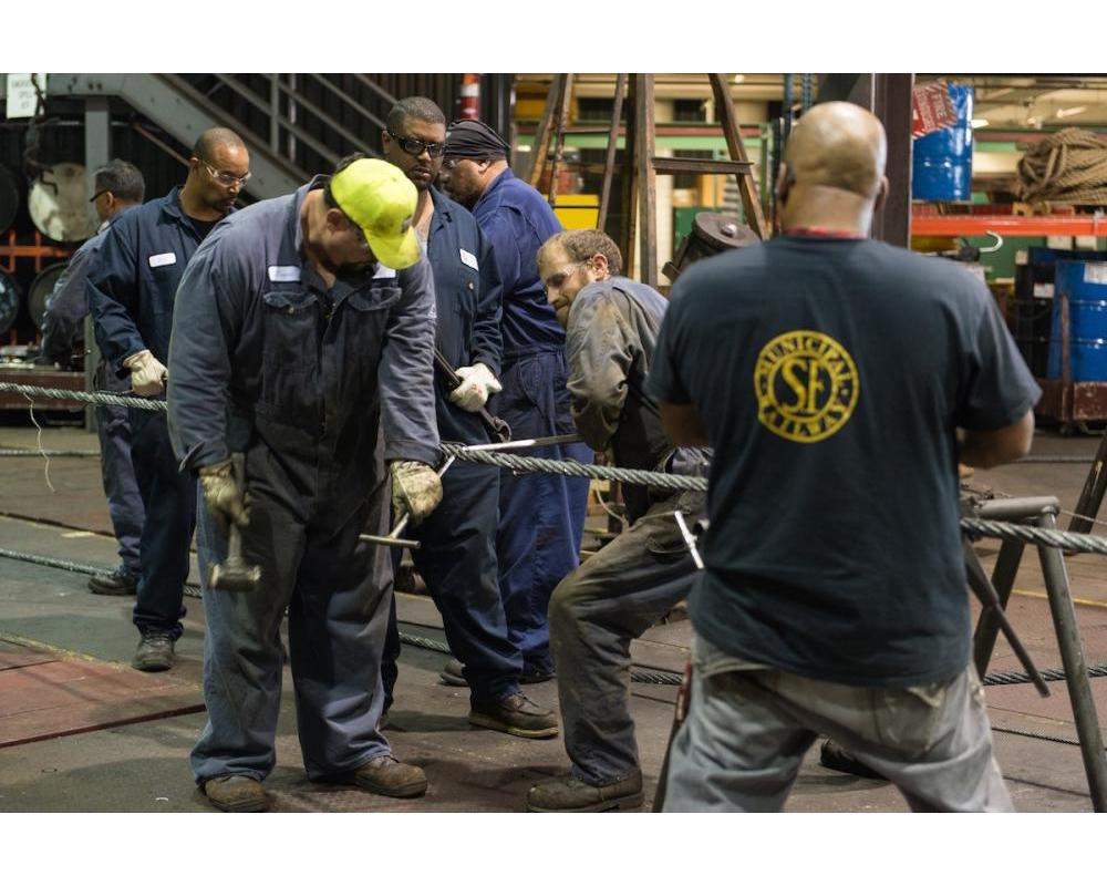 workers splicing a cable