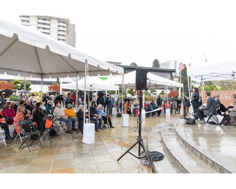 Executive Director Tilly Chang of the San Francisco County Transportation Authority makes remarks to a crowd of people